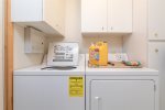Easily operable washer/dryer adds to the convenience of our picturesque home.